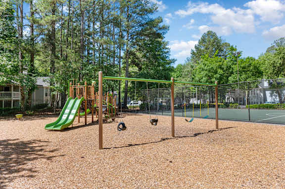 playground with trees at Manchester at Mansell, Georgia ,30076
