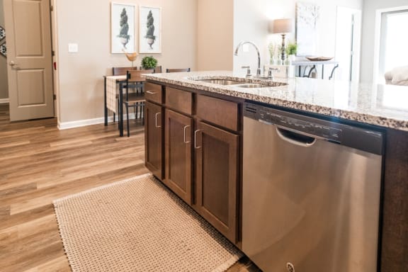 Kitchen bar with a sink and a dishwasher at Meridian Park in Collierville, TN 38017