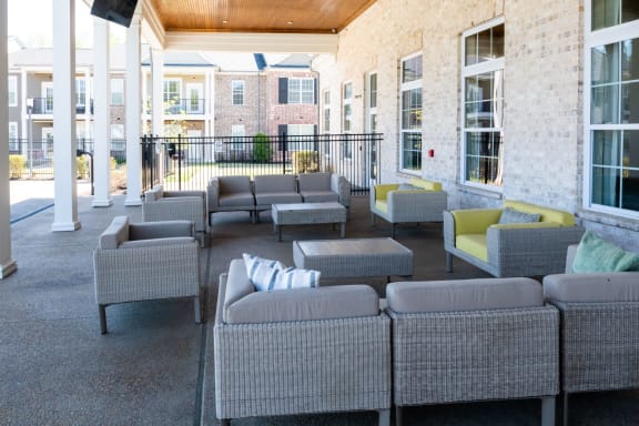 outdoor patio with couches and tables  at Meridian Park Apartments, Tennessee, 38017
