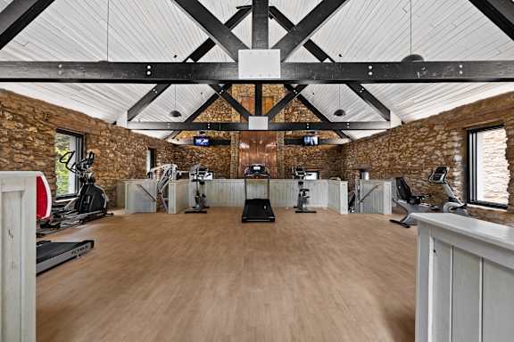 Gym build with brick and machines at Mill House at East Cobb, Marietta, GA
