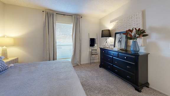 Stylish Bedroom at Pointe Royal in Overland Park, KS