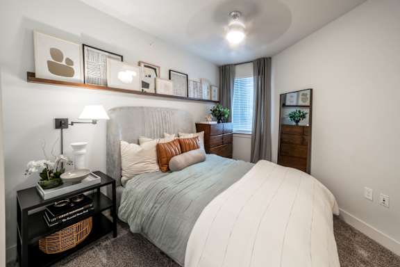 bedroom with large bed and window