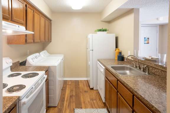 Kitchen with Wooden Cabinets at Stewarts Ferry Apartments, Nashville, TN