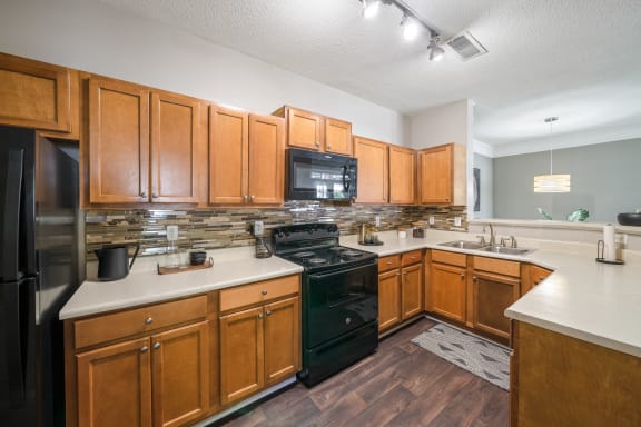 Kitchens With Ample Storage at Sugarloaf Crossing Apartments, Georgia