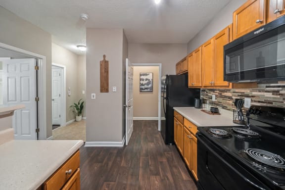 Refrigerator And Kitchen Appliances at Sugarloaf Crossing Apartments, Georgia, 30046