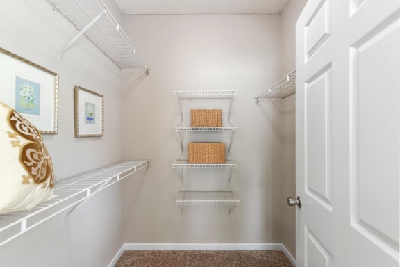 Model closet S at Sugarloaf Crossings Apartments in Lawrenceville, GA 30046