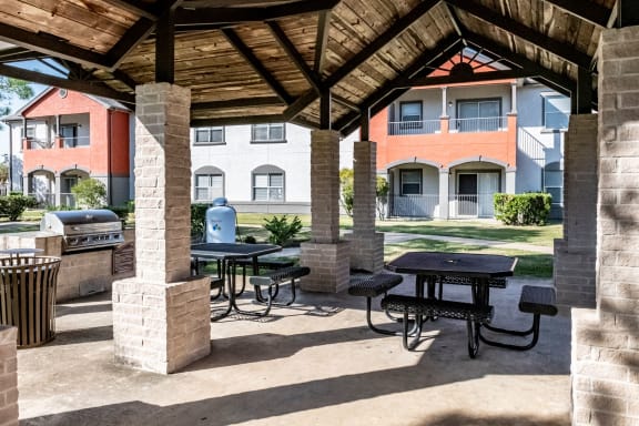 Grilling Area and Picnic Tables  located at Retreat at Steeplechase in Houston, TX 77065