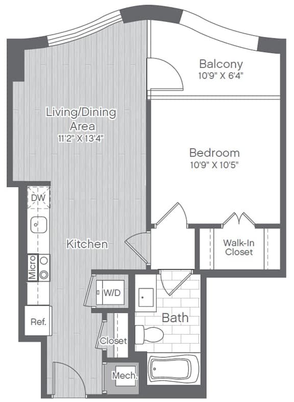 A floor plan of a small apartment with a living/dining area, kitchen, bathroom, and bedroom.