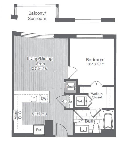 A floor plan of a home with a living area, kitchen, bathroom, and bedroom.