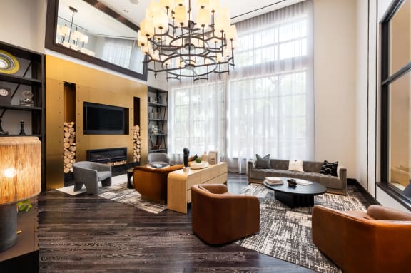 a conference room with a large window and a chandelier