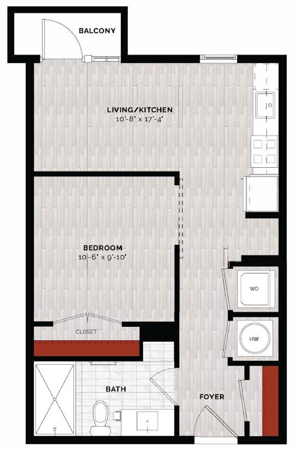 A floor plan of a small apartment with a living/kitchen area, bedroom, bathroom, closet, and foyer.