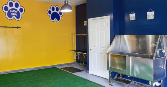 a play room with a pool table and a door