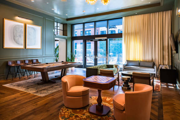Game room lounge with billiards and chess table