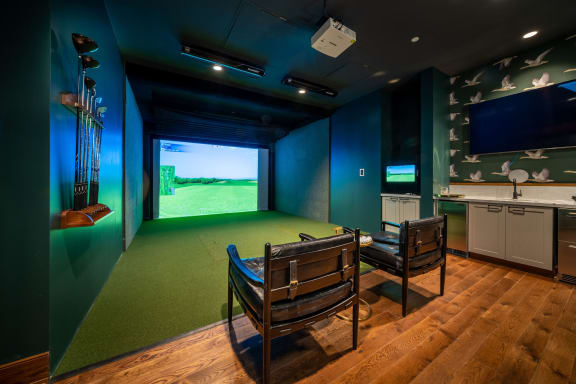 Golf simulator and lounge