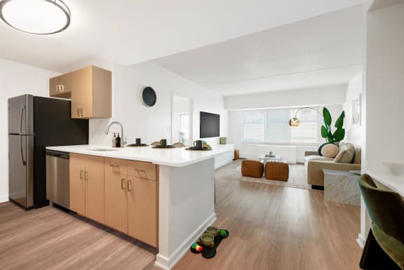 an open kitchen and living room in an apartment