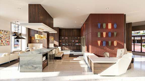 A modern living room with a kitchen area and a large window.