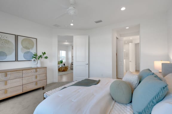 a bedroom with a bed and a dresser at Marisol, Bradenton Florida 34211