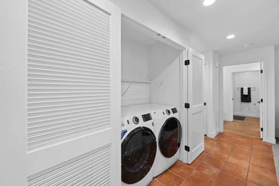 A laundry room with a washer and dryer.