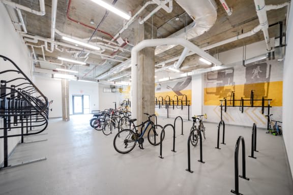 a group of bikes parked in a large room