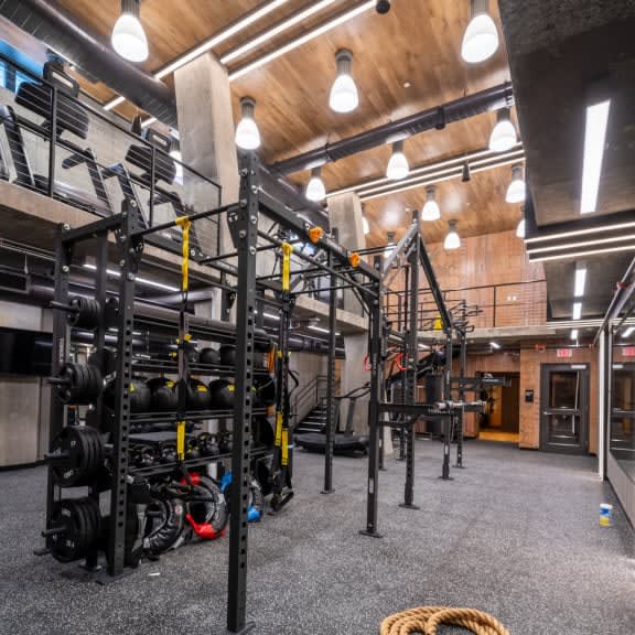 the gym is equipped with weights and cardio equipment