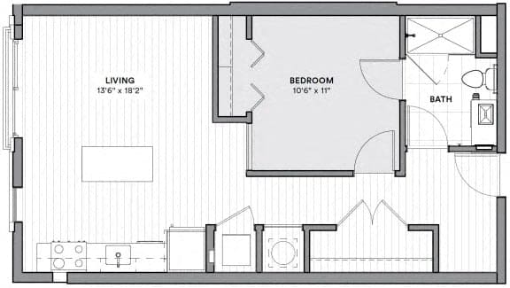 A floor plan of a small apartment with a living room, bedroom, and bathroom.