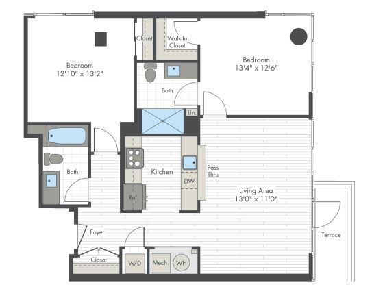 A floor plan of a house with two bedrooms, a living area, a kitchen, and a foyer.