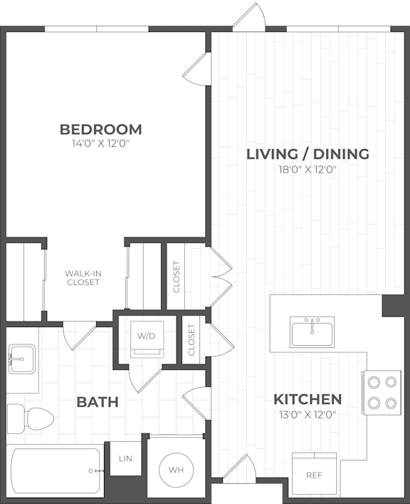 A floor plan of a small apartment with a bedroom, bathroom, kitchen, and living/dining area.