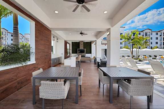 A patio with a table and chairs is shown.
