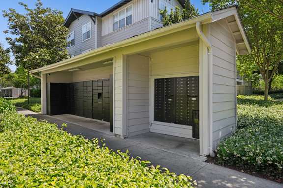 A house with a garage and a driveway.