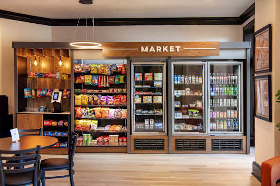 A market with a variety of snacks and drinks on display.