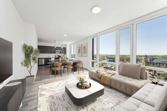 A modern living room with a view of the city.