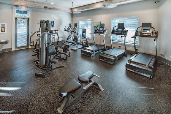 Gym with treadmills, elliptical machines, and other exercise equipment at Retreat at Greystone, Birmingham, AL, 35242