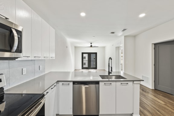 Stainless Steel Appliance Kitchen with White Cabinets at Azalea, Luxury Tampa Apartments
