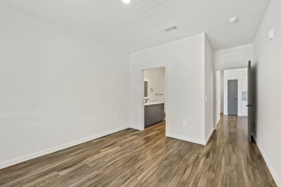 Renovated two bedroom apartment with wood floors and modern fixtures at Azalea Luxury Tampa Apartments