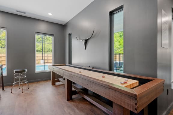 the pool table in the game room is made of reclaimed wood at The Lodge at Overland, Minnesota, 55901