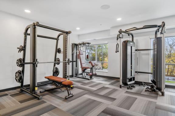 a home gym with exercise equipment and a windowat The Aurilla, Cottage Grove, MN, 55016