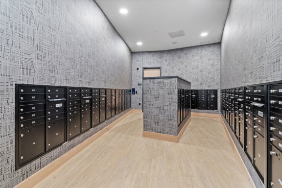 a wine cellar with rows of wine racks and wooden floors