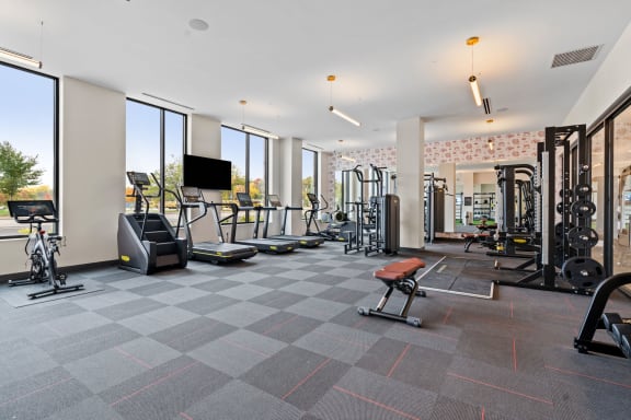 the gym at the flats at big tex apartments