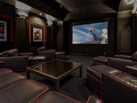 Community movie theater with surround sound at Central Park Apartments in Worthington, Columbus, OH