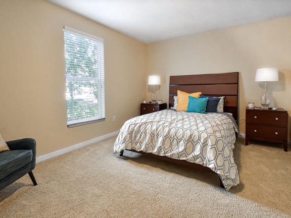 Fully-furnished modern bedroom at Kenyon Square Apartments, Ohio