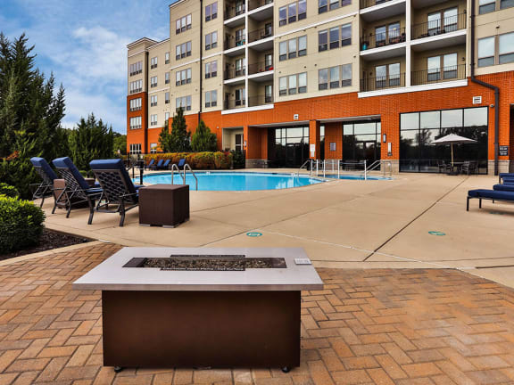 Pool area at Residences at The Streets of St. Charles Apartments in Missouri, 63303