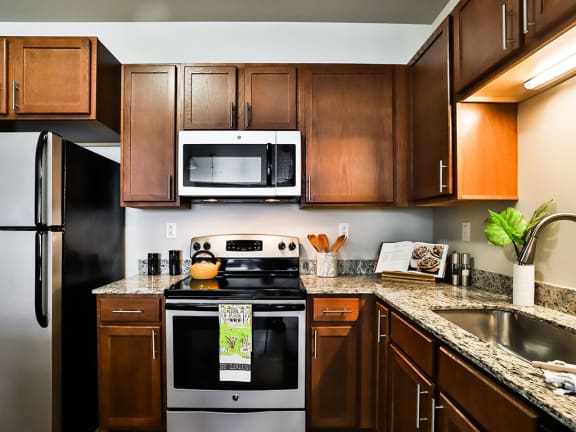 Kitchen view at Residences at The Streets of St. Charles Apartments in St. Charles, MO, 63303