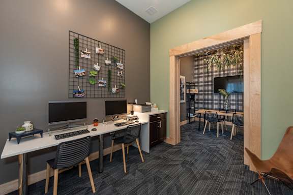 a home office with two desks and a computer at The Bend Arbordale, Williamsburg, 23188
