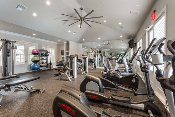 view of fitness center with cardio machines and weights at Annandale Apartment Homes, Murfreesboro, Tennessee