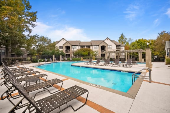 the reserve at city center apartments swimming pool with chaise lounge chairs  at 150 Summit, Birmingham, AL, 35243