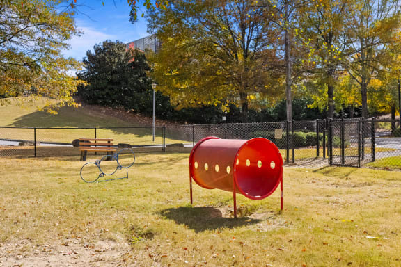 a red mailbox in the middle of a park  at 150 Summit, Birmingham