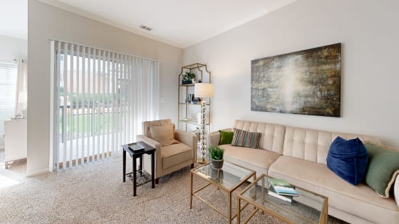 a living room with a couch and a table