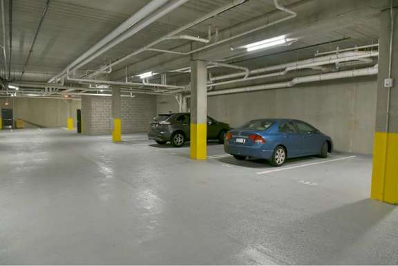 car is parked in a parking garage. at The Arlow on Kellog, Minnesota