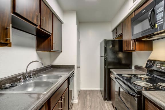 Spacious Kitchen With Pantry Cabinet at The Reserve at City Center North, Houston, 77043