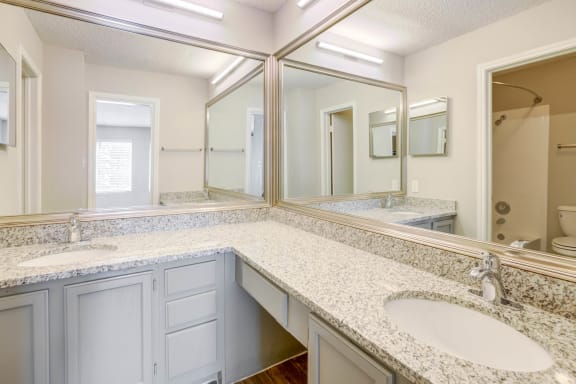Designer Granite Countertops In All Bathrooms at Turtle Creek Vista, Texas, 78229